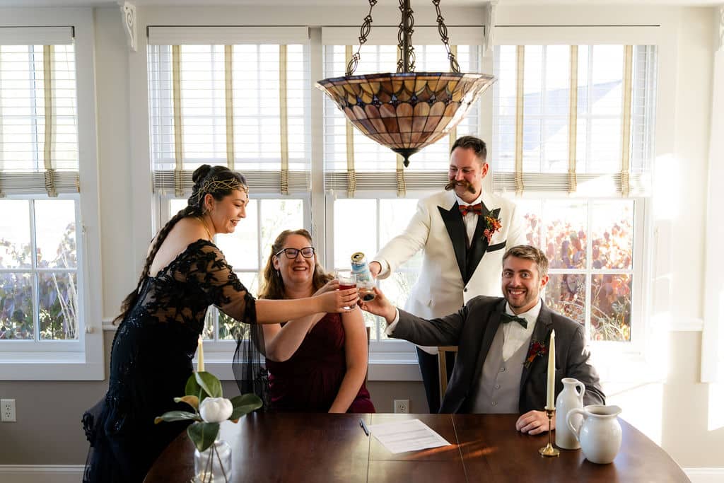 Best Maine Resorts For Weddings (Plus A Private Estate You Shouldn’t Miss) 3 Ash point estate maine resorts, wedding party toasts at a table