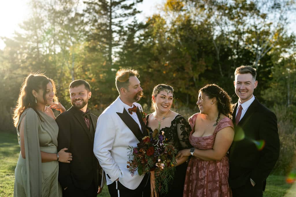 Family Resorts In Maine Vs. Private Coastal Estates: Which Is Right For Your Family Gathering? 2 Ash point estate an alternative to family resorts in maine, family and friends join bride and groom on lawn for photos