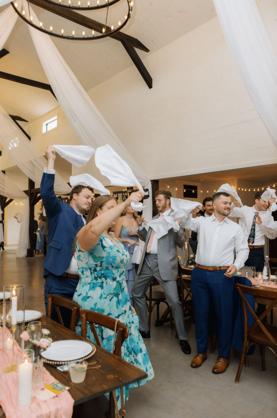 How To Choose The Perfect Wedding Reception Venue In Maine 4 Ash point estate wedding reception venues maine, family waves white napkins to celebrate bride and groom