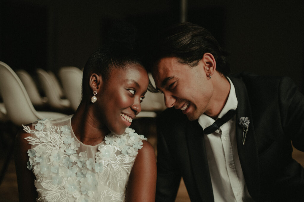 Ash point estate how to choose a wedding venue in maine, bride and groom hug each other. Mixed race black and white interracial wedding couple